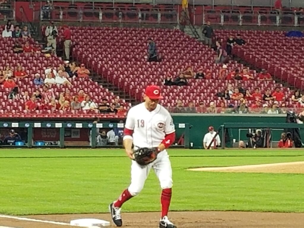 Joey Votto preparing at first base prior to the start of the game.